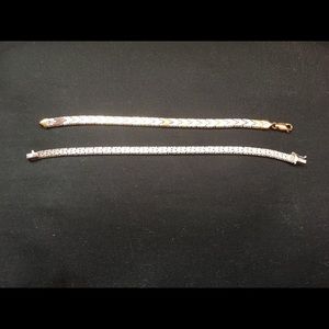 2 silver bracelets